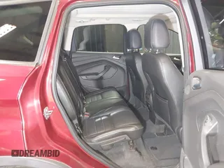 2014 Ford Escape Titanium with VIN 1FMCU9J9XEUD69589, listed as a IAAI auction lot 42031882 with 123,632 mi miles and . Bid and sale history available at DreamBid. Image 8.