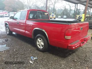 1998 Dodge Dakota SLT with VIN 1B7GL22X2WS691119, listed as a IAAI auction lot 41056451 with 219,224 mi miles. Bid and sale history available at carsss.com. Image 3.