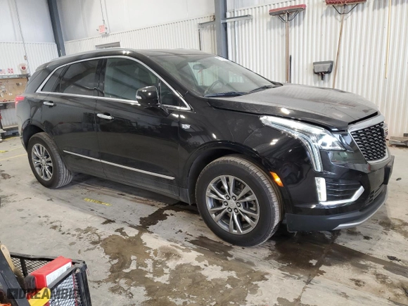 2023 Cadillac XT5 AWD Premium Luxury with VIN 1GYKNDRS0PZ147473, listed as a Copart auction lot 87746115 with 34,419 mi miles and Salvage Title. Bid and sale history available at carsss.com. Image 4.