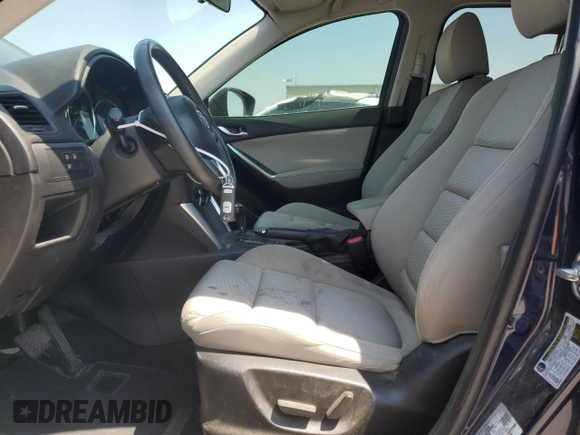 2014 Mazda CX-5 Touring z VIN JM3KE2CYXE0327950, wystawiony jako Copart lot #51390585 z przebiegiem 129 523 mil mil oraz Czysty tytuł • Clean title. Historia ofert i sprzedaży dostępna na DreamBid. Obrazek 7.