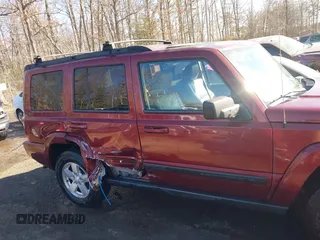 2007 Jeep Commander Sport z VIN 1J8HG48P37C573256, wystawiony jako IAAI lot #41448883 z przebiegiem 146 581 mil mil oraz . Historia ofert i sprzedaży dostępna na DreamBid. Obrazek 13.