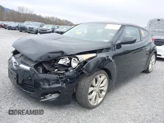 2012 Hyundai Veloster w/Gray Int z VIN KMHTC6AD6CU054422, wystawiony jako IAAI lot #41930634 z przebiegiem 144 681 mil mil oraz . Historia ofert i sprzedaży dostępna na DreamBid. Obrazek 6.