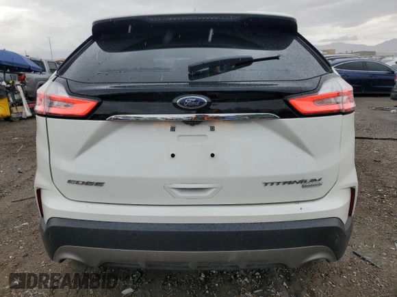 2020 Ford Edge Titanium с VIN 2FMPK3K99LBA90222, выставлен на аукционе Copart как лот 55849345 с пробегом 25 330 миль миль и Списание • Salvage title. История ставок и продаж доступна на DreamBid. Изображение 6.