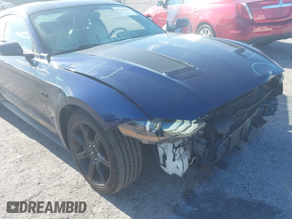 2019 Ford Mustang GT z VIN 1FA6P8CF5K5180706, wystawiony jako IAAI lot #42763920 z przebiegiem 73 915 mil mil oraz . Historia ofert i sprzedaży dostępna na DreamBid. Obrazek 17.