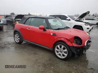 2009 MINI Convertible with VIN WMWMR33539TU96291, listed as a Copart auction lot 83849744 with 65,056 mi miles and Salvage title. Bid and sale history available at DreamBid. Image 4.