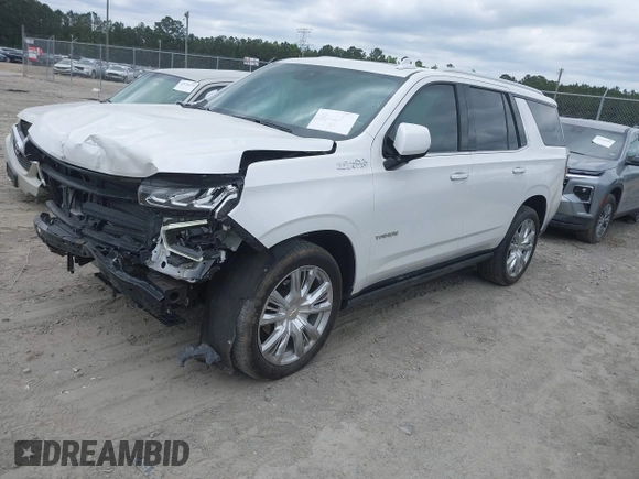 2023 Chevrolet Tahoe High Country z VIN 1GNSCTKL1PR544951, wystawiony jako IAAI lot #42113529 z przebiegiem 33 106 mil mil oraz . Historia ofert i sprzedaży dostępna na DreamBid. Obrazek 2.