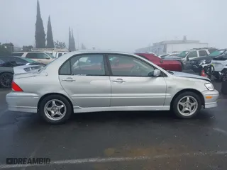 2002 Mitsubishi Lancer OZ-Rally with VIN JA3AJ86E92U038601, listed as a IAAI auction lot 41025991 with 162,450 mi miles. Bid and sale history available at carsss.com. Image 13.