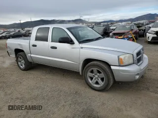 2007 Dodge Dakota SLT with VIN 1D7HW48K27S147617, listed as a Copart auction lot 74064254 with 150,069 mi miles and Clean Title. Bid and sale history available at carsss.com. Image 4.