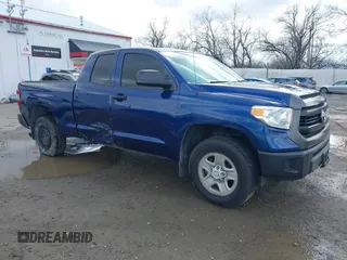 2014 Toyota Tundra SR with VIN 5TFUM5F17EX056082, listed as a IAAI auction lot 41884095 with 155,036 mi miles and . Bid and sale history available at DreamBid. Image 1.