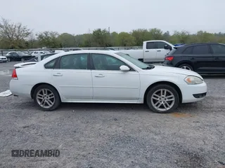 2013 Chevrolet Impala LTZ with VIN 2G1WC5E39D1202260, listed as a IAAI auction lot 41908155 with 210,193 mi miles and . Bid and sale history available at DreamBid. Image 13.