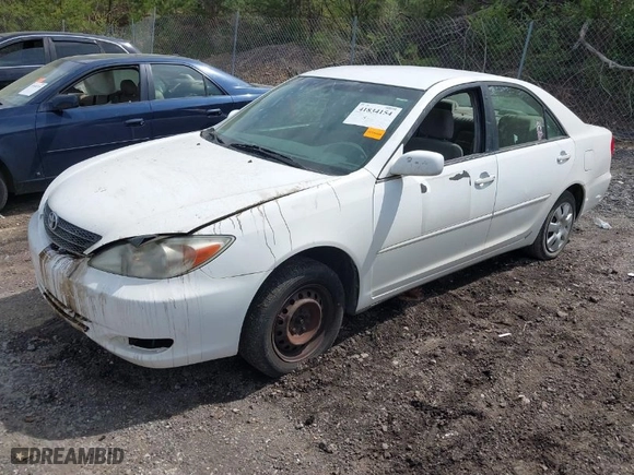 2004 Toyota Camry LE with VIN JTDBE32KX40275598, listed as a IAAI auction lot 41834154 with 343,417 mi miles. Bid and sale history available at carsss.com. Image 2.