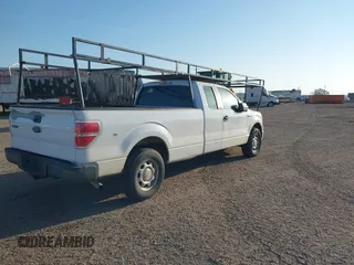 2014 Ford F-150 XL with VIN 1FTFX1CT8EKG36033, listed as a IAAI auction lot 41821235 with 165,934 mi miles. Bid and sale history available at carsss.com. Image 4.