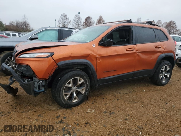 2015 Jeep Cherokee Trailhawk z VIN 1C4PJMBS7FW704980, wystawiony jako Copart lot #70334472 z przebiegiem 127 562 mil mil oraz Szkoda całkowita • Salvage title. Historia ofert i sprzedaży dostępna na DreamBid. Obrazek 1.