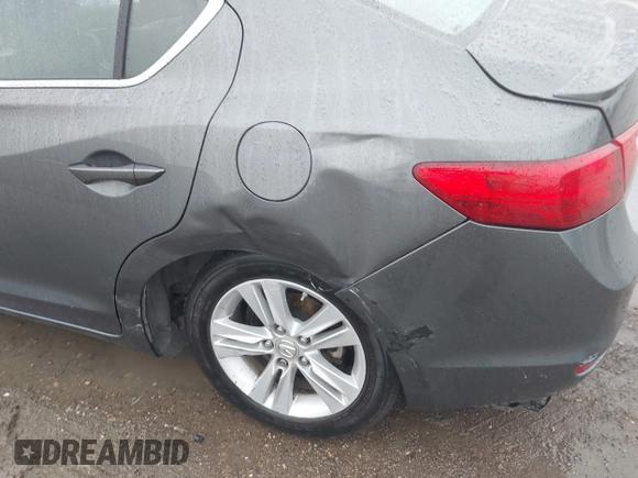2014 Acura ILX Hybrid Technology z VIN 19VDE3F75EE300312, wystawiony jako IAAI lot #41608572 z przebiegiem 126 974 mil mil oraz . Historia ofert i sprzedaży dostępna na DreamBid. Obrazek 17.