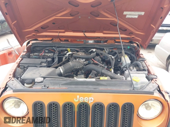 2011 Jeep Wrangler Sport with VIN 1J4AA2D1XBL579882, listed as a IAAI auction lot 42122353 with 153,885 mi miles and . Bid and sale history available at carsss.com. Image 10.