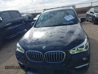 2016 BMW X1 xDrive28i with VIN WBXHT3Z3XG4A48557, listed as a IAAI auction lot 41387960 with 84,821 mi miles. Bid and sale history available at carsss.com. Image 12.