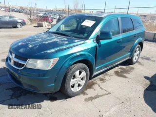 2009 Dodge Journey SXT with VIN 3D4GG57V09T170094, listed as a IAAI auction lot 41867577 with 122,831 mi miles. Bid and sale history available at carsss.com. Image 2.