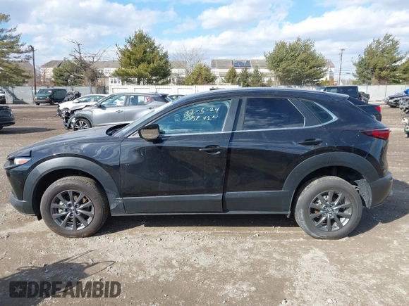 2022 Mazda CX-30 S with VIN 3MVDMBALXNM402265, listed as a IAAI auction lot 41458605 with 76,291 mi miles and . Bid and sale history available at carsss.com. Image 14.