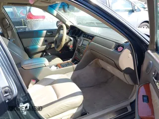 2004 Acura RL w/Navigation System with VIN JH4KA96634C006366, listed as a IAAI auction lot 42054689 with 350,809 mi miles. Bid and sale history available at carsss.com. Image 5.