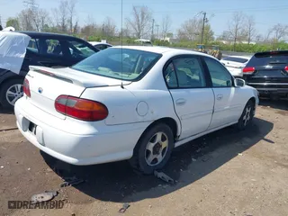 2003 Chevrolet Malibu LS with VIN 1G1NE52J13M538299, listed as a IAAI auction lot 42051511 with 213,853 mi miles. Bid and sale history available at carsss.com. Image 4.