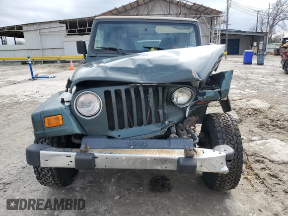 2002 Jeep Wrangler Sahara with VIN 1J4FA59S22P712913, listed as a Copart auction lot 43350115 with 86,320 mi miles and Salvage Title. Bid and sale history available at carsss.com. Image 5.