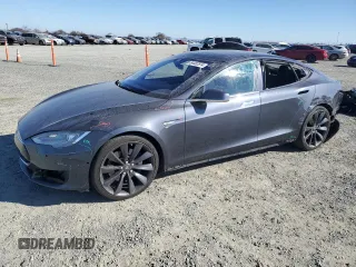 2015 Tesla Model S 85D with VIN 5YJSA1S23FF096856, listed as a Copart auction lot 84482874 with 90,409 mi miles and Salvage Title. Bid and sale history available at carsss.com. Image 1.