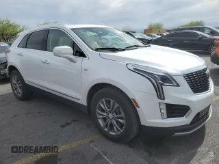 2021 Cadillac XT5 FWD Premium Luxury with VIN 1GYKNCRS0MZ110560, listed as a Copart auction lot 52779575 with 44,559 mi miles and Salvage title. Bid and sale history available at DreamBid. Image 4.
