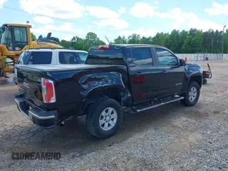 2018 GMC Canyon 2WD z VIN 1GTG5BEN9J1137949, wystawiony jako IAAI lot #42189911 z przebiegiem 98 296 mil mil oraz . Historia ofert i sprzedaży dostępna na DreamBid. Obrazek 4.