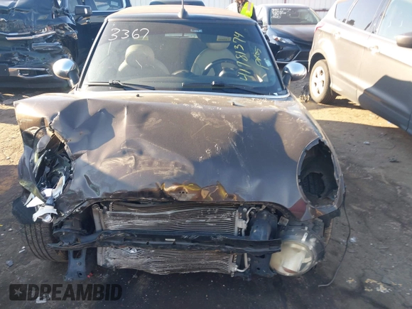 2011 MINI Convertible with VIN WMWZN3C55BT133367, listed as a IAAI auction lot 41781374 with 124,036 mi miles and . Bid and sale history available at DreamBid. Image 12.