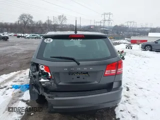 2014 Dodge Journey SE with VIN 3C4PDCAB0ET182376, listed as a IAAI auction lot 41569006 with 106,024 mi miles and . Bid and sale history available at DreamBid. Image 16.