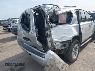2016 Chevrolet Tahoe LS with VIN 1GNSCAEC2GR392937, listed as a IAAI auction lot 42648714 with 166,764 mi miles and . Bid and sale history available at DreamBid. Image 4.