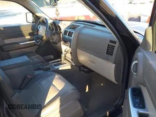 2007 Dodge Nitro SLT with VIN 1D8GU58K27W549214, listed as a IAAI auction lot 41358109 with 99,530 mi miles. Bid and sale history available at carsss.com. Image 5.