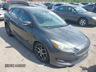 2015 Ford Focus SE with VIN 1FADP3F22FL259982, listed as a IAAI auction lot 42638145 with 199,216 mi miles and . Bid and sale history available at DreamBid. Image 1.