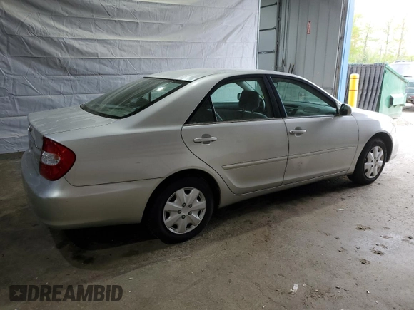 2003 Toyota Camry LE with VIN 4T1BE32K33U710903, listed as a Copart auction lot 56976585 with 157,444 mi miles and Clean Title. Bid and sale history available at DreamBid. Image 3.
