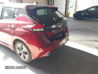 2018 Nissan LEAF SV z VIN 1N4AZ1CP9JC311490, wystawiony jako IAAI lot #42152814 z przebiegiem 43 705 mil mil oraz . Historia ofert i sprzedaży dostępna na DreamBid. Obrazek 6.