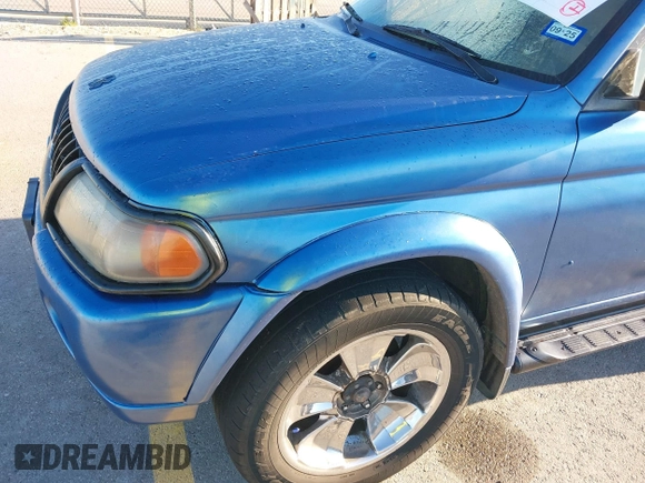 2003 Mitsubishi Montero XLS z VIN JA4MT31R13J045223, wystawiony jako IAAI lot #42208271 z przebiegiem 188 068 mil mil oraz . Historia ofert i sprzedaży dostępna na DreamBid. Obrazek 14.