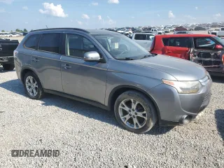 2015 Mitsubishi Outlander SE with VIN JA4AZ3A32FZ008250, listed as a Copart auction lot 62497555 with Not provided miles and Salvage title. Bid and sale history available at DreamBid. Image 4.