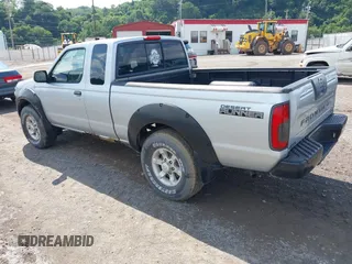 2001 Nissan Frontier SE Desert Runner z VIN 1N6ED26T61C303868, wystawiony jako IAAI lot #42698412 z przebiegiem 223 551 mil mil oraz . Historia ofert i sprzedaży dostępna na DreamBid. Obrazek 3.