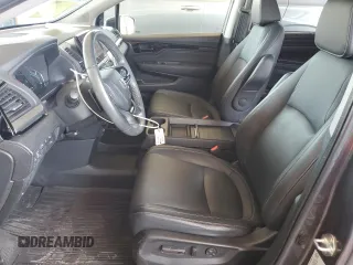 2021 Honda Odyssey Touring with VIN 5FNRL6H88MB040703, listed as a Copart auction lot 60340095 with 66,171 mi miles and Salvage title. Bid and sale history available at DreamBid. Image 7.