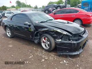 2001 Ford Mustang GT Deluxe with VIN 1FAFP42X01F256120, listed as a IAAI auction lot 42446560 with Not provided miles and . Bid and sale history available at DreamBid. Image 1.