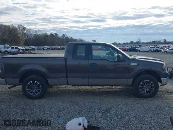 2005 Ford F-150 XLT with VIN 1FTPX12505NB28550, listed as a IAAI auction lot 41381125 with 248,711 mi miles. Bid and sale history available at carsss.com. Image 13.