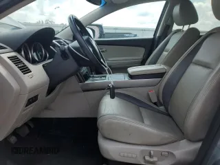 2012 Mazda CX-9 Grand Touring with VIN JM3TB2DVXC0361644, listed as a Copart auction lot 66092895 with 121,021 mi miles and Clean title. Bid and sale history available at DreamBid. Image 7.