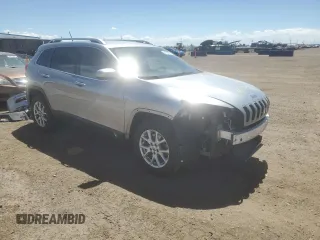 2015 Jeep Cherokee Latitude with VIN 1C4PJMCB6FW734003, listed as a Copart auction lot 54659085 with 146,379 mi miles and Salvage Title. Bid and sale history available at DreamBid. Image 4.
