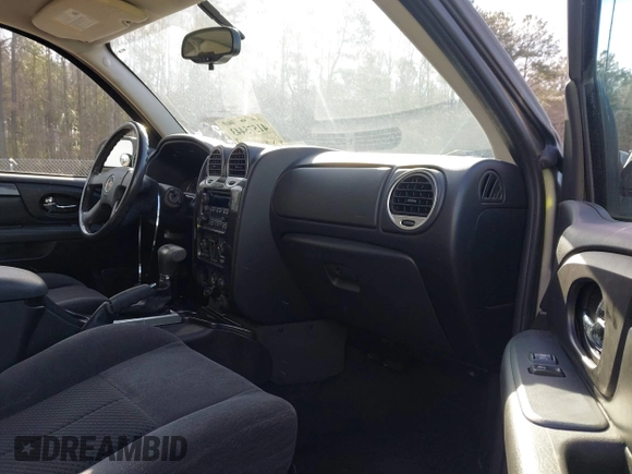 2007 GMC Envoy SLE with VIN 1GKDS13S372241844, listed as a IAAI auction lot 41575443 with 144,726 mi miles. Bid and sale history available at carsss.com. Image 5.