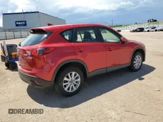 2016 Mazda CX-5 Sport with VIN JM3KE4BYXG0702655, listed as a Copart auction lot 63120205 with 64,403 mi miles and Salvage title. Bid and sale history available at DreamBid. Image 3.