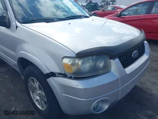 2005 Ford Escape Limited with VIN 1FMYU94125KA81010, listed as a IAAI auction lot 41865373 with 123,972 mi miles. Bid and sale history available at carsss.com. Image 6.