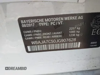 2018 BMW 5 Series 530i xDrive with VIN WBAJA7C50JG907628, listed as a IAAI auction lot 42646818 with 100,215 mi miles and . Bid and sale history available at DreamBid. Image 9.