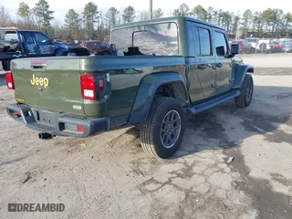 2023 Jeep Gladiator Overland with VIN 1C6HJTFG9PL507484, listed as a IAAI auction lot 41486457 with 54,871 mi miles. Bid and sale history available at carsss.com. Image 4.