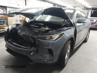 2022 Infiniti QX50 Essential with VIN 3PCAJ5CB6NF121488, listed as a IAAI auction lot 42043828 with 17,762 mi miles and . Bid and sale history available at DreamBid. Image 2.