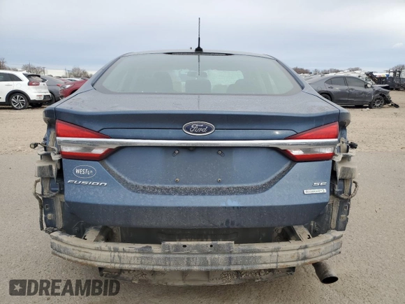 2018 Ford Fusion SE with VIN 3FA6P0HD9JR176808, listed as a Copart auction lot 48559725 with 106,874 mi miles and Salvage Title. Bid and sale history available at DreamBid. Image 6.